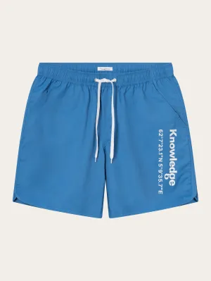 Swim shorts with elastic waist and Knowledge print - Campanula